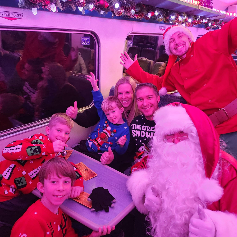 Santa meeting guests on board THE POALR EXPRESS™ Train Ride 