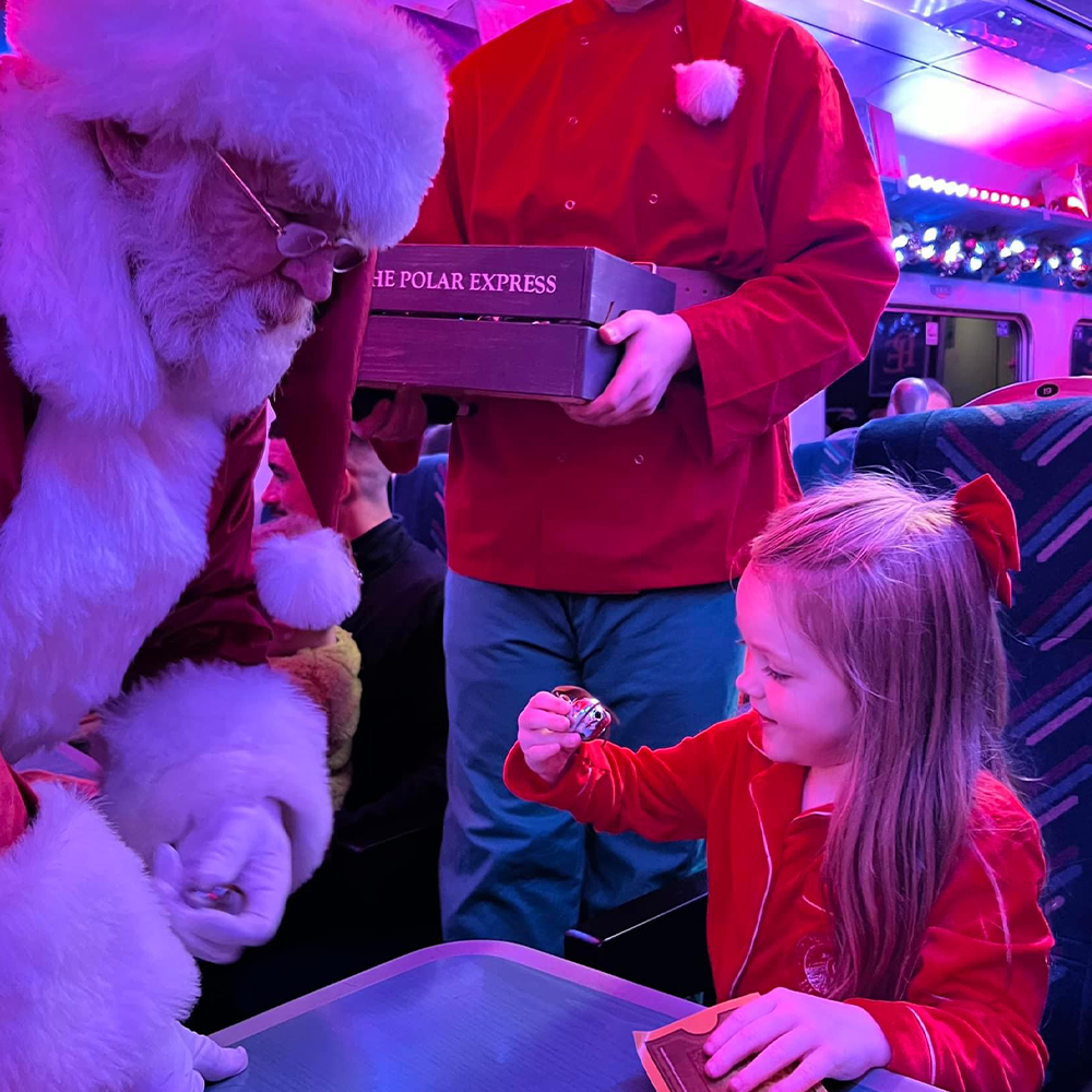 Santa meeting guests on board THE POLAR EXPRESS™ Train Ride 